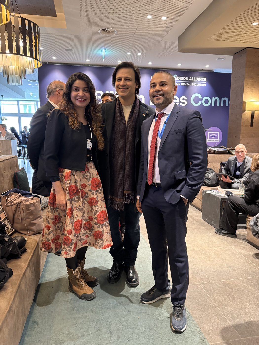Shameek with two guests at the Edison Alliance session in Davos