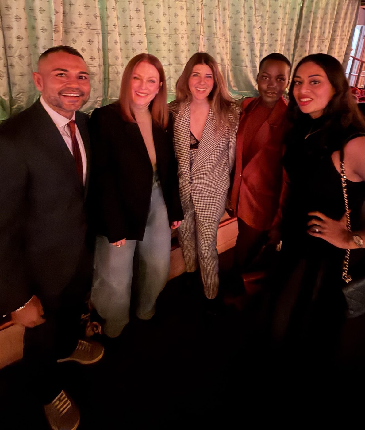 Shameek with Julianne Moore, Lupita Nyong'o and other guests at an evening reception