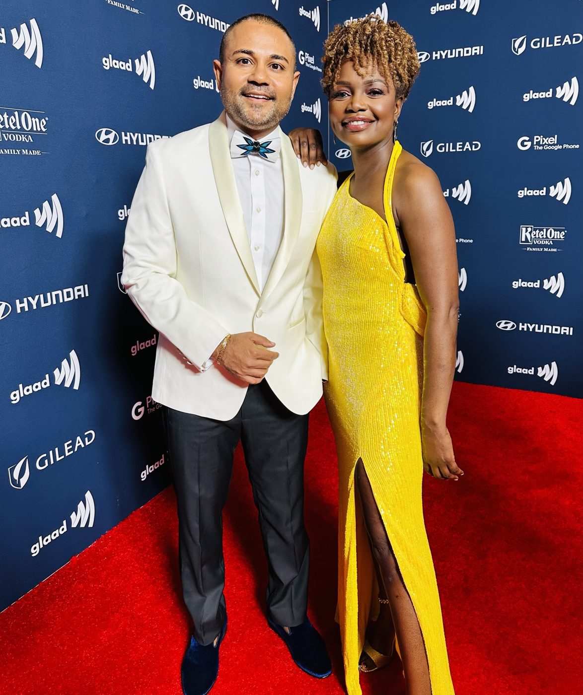 Shameek in a white dinner jacket on the GLAAD red carpet